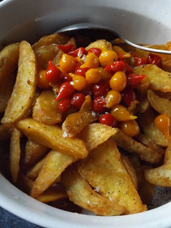 Una foto de Cuñas de patatas al orégano