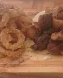 Fried porque and  whole onion rings by luis