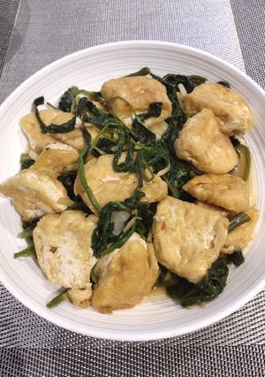 A picture of Sauteed Kangkong with Tofu.