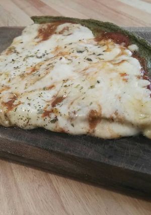 Una foto de Pizza de espinaca y coliflor