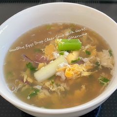 A picture of Healthy Eggs Drop Clear Soup with Herbs.