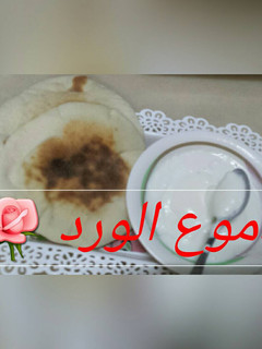 صورة لوصفة الثوميه مع العيش العربي البيتي 😍😍
