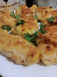 صورة لوصفة سكالوب داند باني و فارسي بالجبن 🧀 و زيتون🌿
