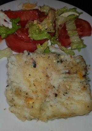 Una foto de Arrollado de papas espinaca y ricotta