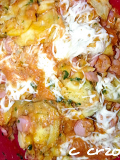 Una foto de Patatas con queso