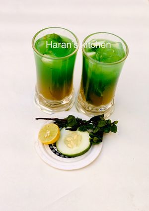 A picture of Mint leaves and cucumber juice.