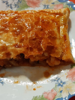 Una foto de Empanada de langostinos y champiñones