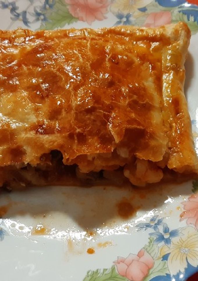 Una foto de Empanada de langostinos y champiñones