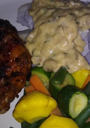 A picture of Amadumbe with coriander mushroom sauce.