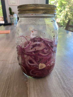 A picture of Pickled red onions 🧅.