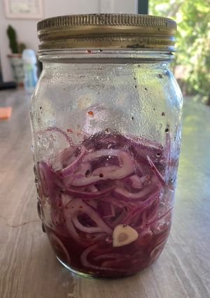 A picture of Pickled red onions 🧅.