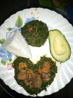 A picture of Ugali,kales and liver stew.