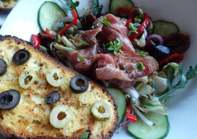 Bresaola mariné et tartine aux olives