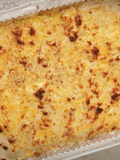 Una foto de Canelones de Costilla de cerdo y Setas