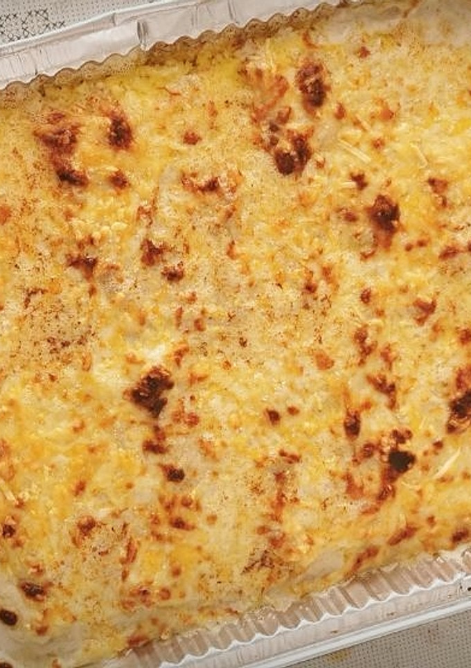 Una foto de Canelones de Costilla de cerdo y Setas