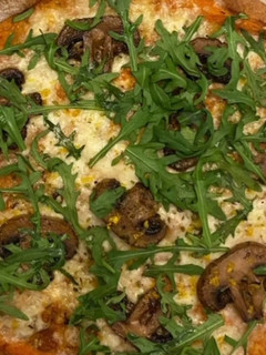 Foto de Pizza de Cogumelos e Rúcula
