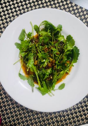 A picture of Mustard leaves in Garlic sauce.