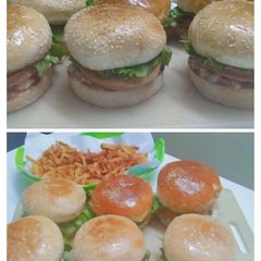 A picture of Chicken Burger with fries.
