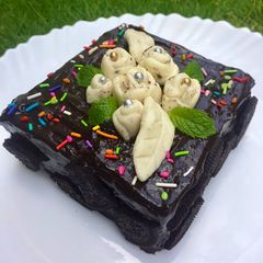 A picture of Bread cake with Oreo frosting.