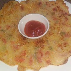 A picture of Bread uttapam.