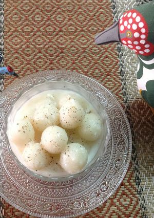 A picture of Steamed Rice balls in Coconut Sauce / Pal Kozhukattai.
