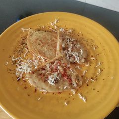 Whole wheat Cheese garlic onion paratha A picture of Whole wheat Cheese garlic onion paratha.