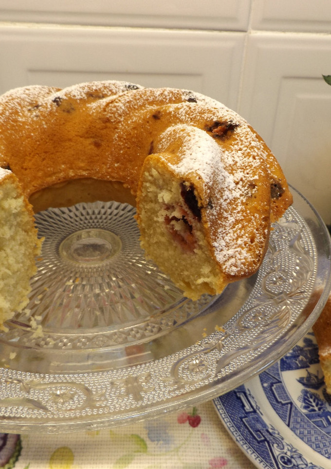 Una foto de Cake de arándanos y frambuesas