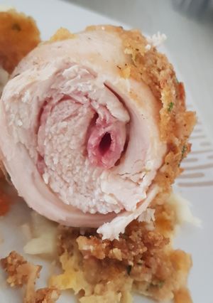 Una foto de Pollo apanado relleno