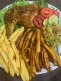 Juicy roasted chicken with chips & plantain and guacamole