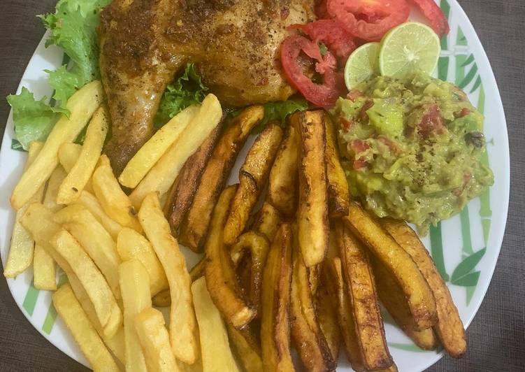 Tasty And Delicious of Juicy roasted chicken with chips &amp; plantain and guacamole