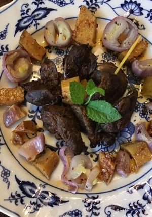 A picture of California Farm Tea Smoked Shallots and Chicken Liver Snack.