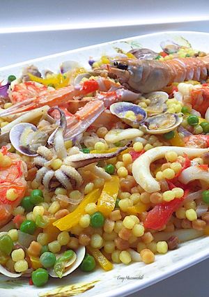Foto di Fregola sarda allo zafferano con pesce