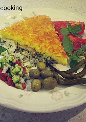 عکسی از دستور تهچين ماهى🐟🐟🐟