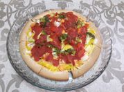 Una foto de pizza vegana