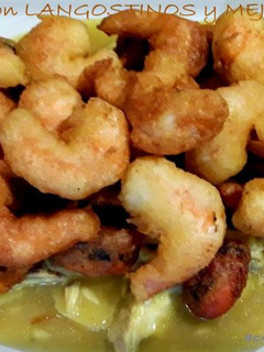 Una foto de Lubina con Langostinos y Mejillones en tempura