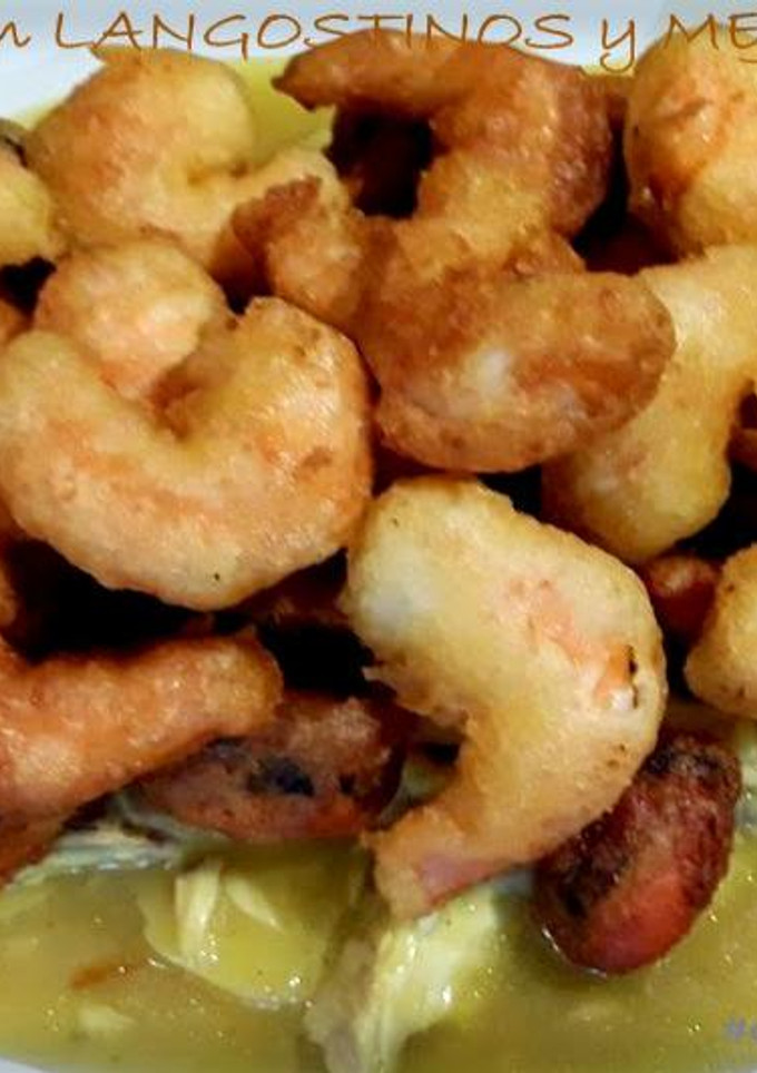Una foto de Lubina con Langostinos y Mejillones en tempura