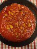 Asado de cerdo con tomate