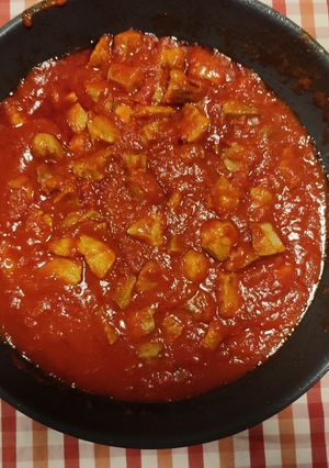 Una foto de Asado de cerdo con tomate