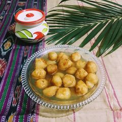 A picture of Bengali Rosh Bora / Sweet Lentil Dumplings.