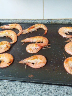 Una foto de Langostinos a la plancha