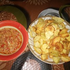 A picture of Cabbage and egg souce and sweet potatoes.
