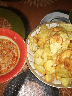A picture of Cabbage and egg souce and sweet potatoes.