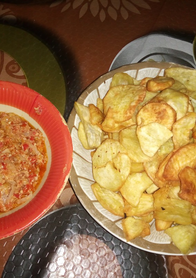 A picture of Cabbage and egg souce and sweet potatoes.