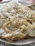 Filetes de seitán en salsa de cebolla y bebida de Almendras