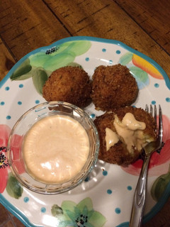 A picture of Mac & Cheese Balls with Buffalo Ranch Dipping Sauce.