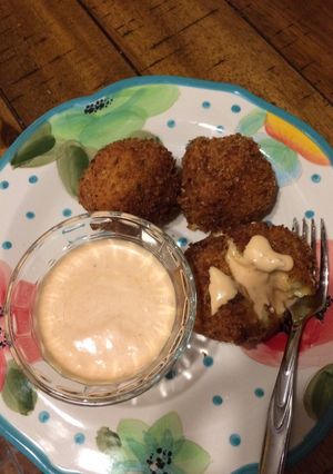 A picture of Mac & Cheese Balls with Buffalo Ranch Dipping Sauce.
