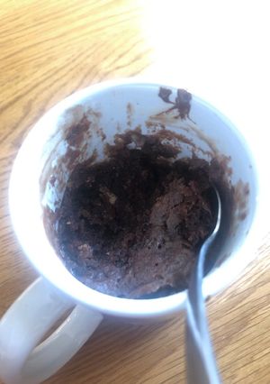 A picture of Gooey brownie in a mug.