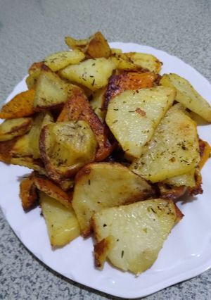 Una foto de Papas y calabaza al horno