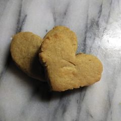 A picture of Heart shaped peanut butter cookies.