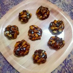 A picture of Buttery jaggery badam chikki.